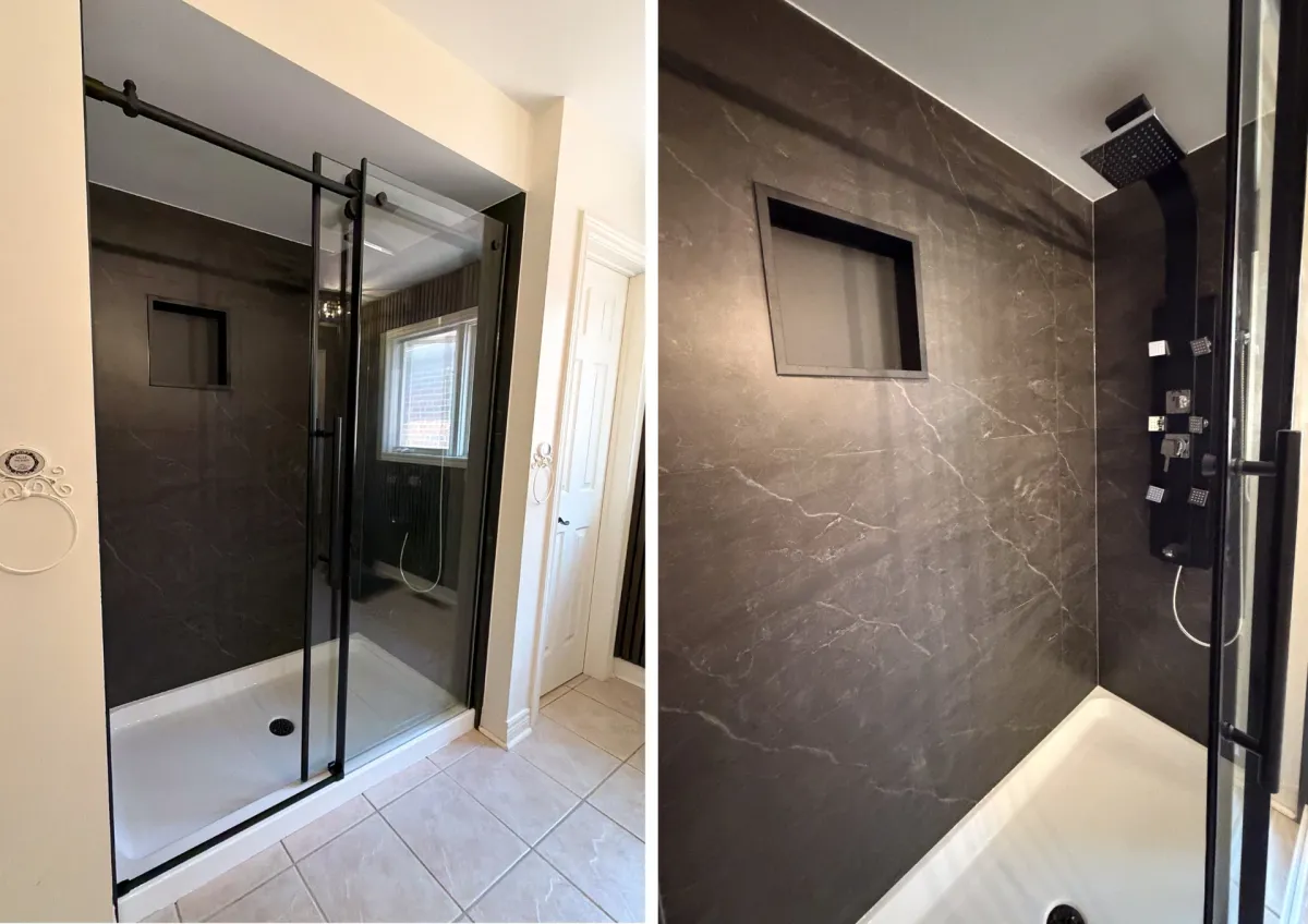 After: a dark slate-look walk-in shower with a black-framed sliding glass door, a recessed niche and a black shower column