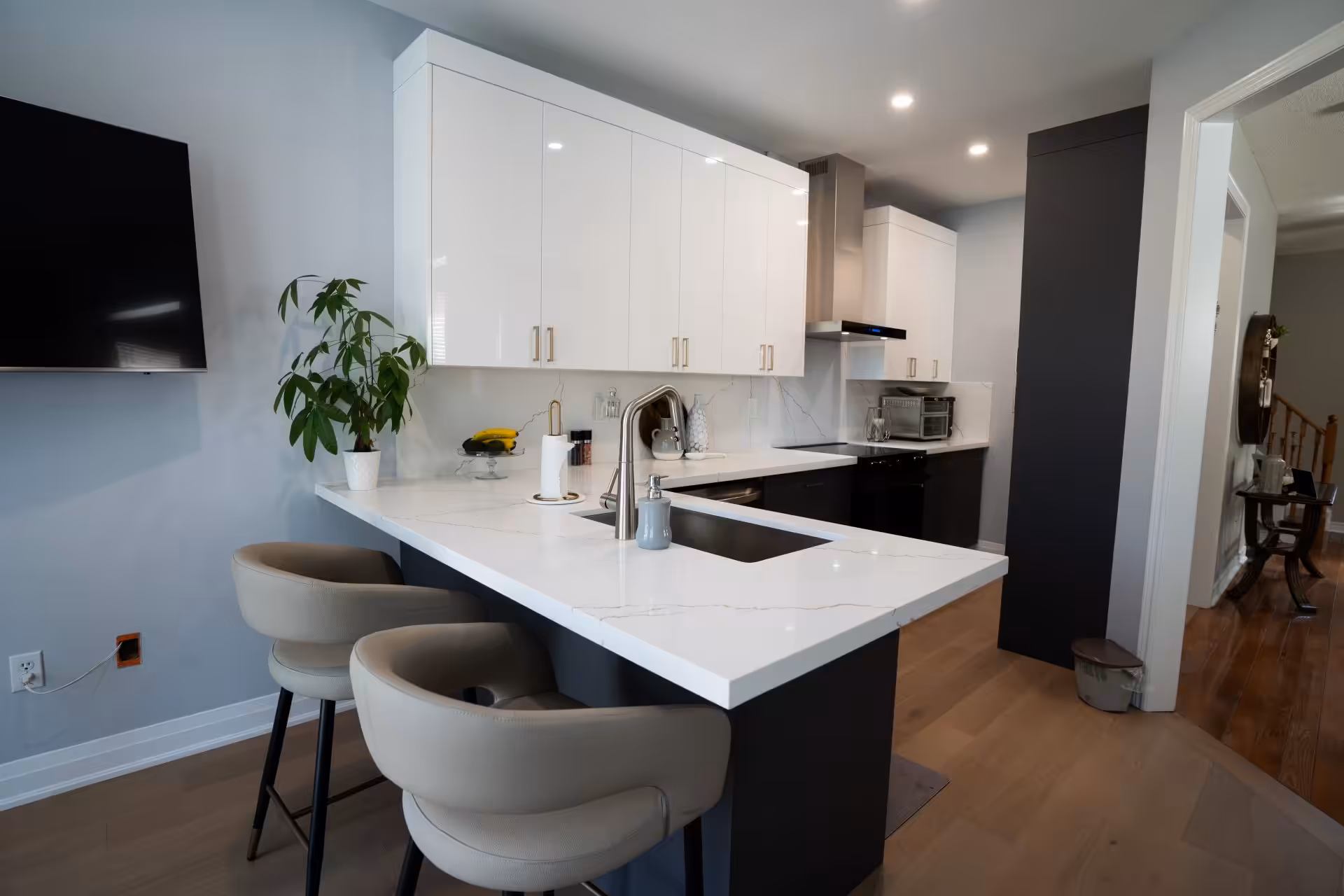 Bright white kitchen with a seated island