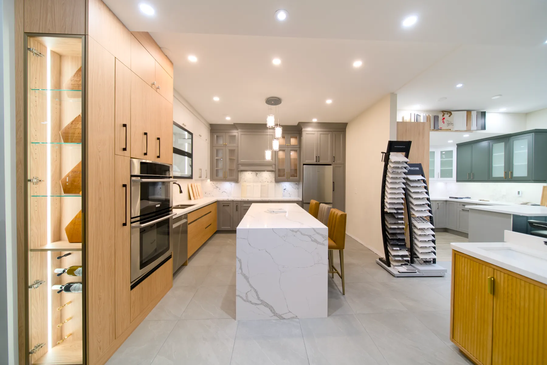 The kitchen side of the Mississauga showroom: two full-size displays and the sample racks